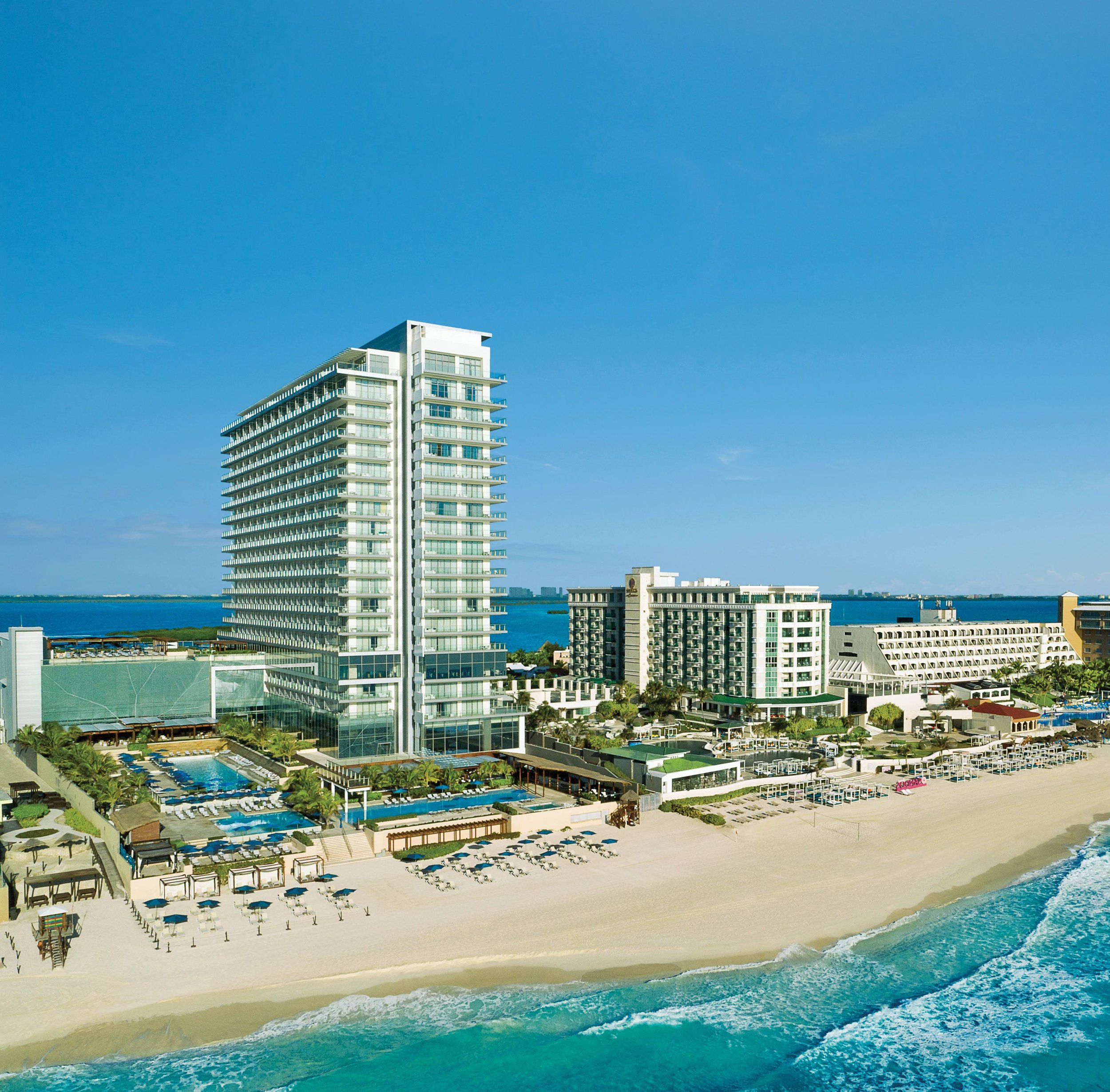 SEVCU-EXT-Aerial-Beach-Pools-1B-CB.jpg